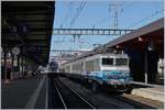 The SNCF BB 22395 with his TER to Valence Ville in Geneva.
In the background a SBB RABe 511 to Vevey.
19.06.2018