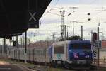 SNCF 22236 pushes an RER out of Strasbourg Cenbtral toward Selestat on 14 February 2024.