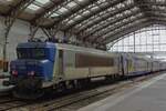 On 23 May 2019 SNCF 22284 pushes a TER train out of Lille-Flandres toward Calais.