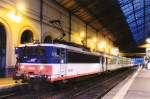 SNCF 25600 -in Parisian RER colours- stands with an RER in Lyon-Perrache on 28 May 2006.