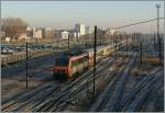 The SNCF BB 26 148 with a TER 200 is arriving at Mulhouse.