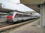 The SNCF BB 26 160 (Sybic) with a  Train  grand ligne  (long distance train to Lyon in Mulhouse.