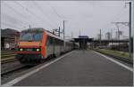 The SNCF BB 26143 with  a TER 200 to Strasbourg in Basel St.