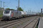 Akiem/CFL Cargo 37020 hauls a northbound tank train through Neuwied (near Koblenz) on 30 April 2026. Neuwied, on the railway tracks on the right bank of the Rhine, sees much railway freights Tu-Sa. 