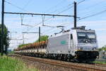The Hexafret 186 184 with a steel roll train on route from the port of Antwerp to France. Bombardier Traxx F140 MS build in 2009 with construction N� 34463. Line 27A at Antwerp Airport. 18-06-2026