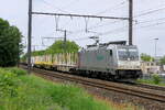 The Hexafret 186 260 with an empty train out of the port of Antwerp on route to France.