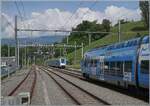 Due to construction work, the La Plaine - Satigny line is currently only single-track; therefore, the TER coming from Valence in the background has to slow down a bit until the TER to Lyon, partially visible on the right in the picture, clears the tr ...