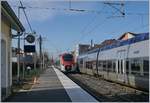 A Léman Express on the way to Evian is arriving at the Thonon-les-Bains Station.