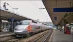. The track recording train TGV Iris 320 is leaving the station of Mulhouse on September 30th, 2013.