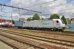 Akiem 186 184 hauls a container train through Antwerpen-Berchem on 29 June 2016.