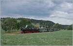 30 ANS CONI'FER /30 years of Coni'Fer - There hasn't been this much traffic here for a good 110 years! At Touillon, the X 2816 of the Association l'autorail X2800 du Haut-Doubs can hardly be seen in the background, while the 52 8163-9 with the four well-fitting four-axle platform wagons steams towards Les Hôpitaux Neufs.

July 15, 2023