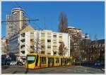 . The Sola Citadis 302 N 2012 is running through rue Louis Pasteur in Mulhouse on December 10th, 2013.