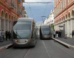 Picture 2: The Tram to  Las Planas  is going and the Tram to  Pont Michel  goes  down the pantograph...