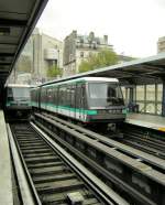 The Paris mtro Line n 1 Chteau de Vincennes to La Dfense comes by the Station La Bastille for a few moment on the day light.