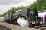 On a grey 18 September 2011, 141 R 840 lets off steam in Longueville.