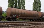 Tank cars Zacens (7932 024-5) of the company ERMEWA, France. On 11.08.2011 in a train, just before Unkel, Germany.