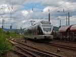 A little Flirt - ET 22 004 (2-piece Stadler Flirt) of the Abellio Rail NRW on 10.07.2012 runs from Siegen-Geisweid, to Siegen main station.