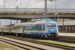 Arriva 223 067 heads a CD train into Regensburg Hbf on 10 June 2009.