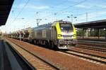 Stadler build CapTrain 159 102 hauls a block train through Berlin Schönefeld Flughafen on 18 September 2020.