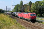DB Cargo 193 326 som drar en annan 193 och ett långt tanktåg från hamnen i Antwerpen till Tyskland. Siemens Vectron MS byggd 2018 med konstruktionsnummer 22401. Linje 27A vid Antwerpen flygplats. 26-08-2026