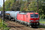 The DB Cargo 193 319 on route with a tank train from the port of Antwerp to Germany. Siemens Vectron MS build in 2018 with construction N� 22398. Line 27A at Antwerp Airport. 18-09-2026