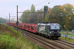The DB Cargo 193 365  I am the backbone of the economy  on route from the port of Antwerp with an empty car train to Germany. Siemens Vectron MS build in 2019 with construction N� 22669. Line 27A at Antwerp Airport. 19-10-2026