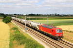 Locomotive 6193 041 from HSL hauling a train of silos is passing in Pousset, 28/6/2025.