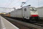 NS has rented a few 186s from Macquarie, like 186 142, here seen at Tilburg, banking an IC to Eindhoven on 18 March 2018.