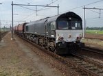 DE 683 hauls Romanian CFR coal wagons through Lage Zwaluwe on 20 July 2016.