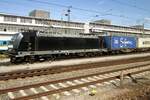 On 17 September 2015 MRCE 185 565 hauls a container train through Regensburg Hbf.