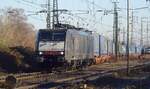 Ecco Rail 189 280 hauls the LKW Walter train through Emmerich on 14 December 2022.