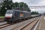 LOCON Benelux 189 098 hauls a railway engineering train through Dordrecht on a grey 16 July 2016.