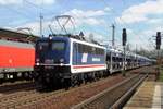 On 11 April 2014 PRESS 110 043 shows herself in an advertising livery for National Express while passing through Pirna with a car carrying train.