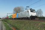 KRE 186 538 hauls a container train through Roond on 31 March 2021.