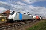 KRE 186 536 hauls a container train through Blerick on 8 April 2021.