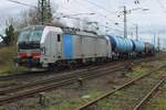On a grey 16 March 2024 railpool 193 143 hauls a tank train out of Emmerich. 