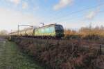 Catching the sun light in the flank, RTB 193 756 passes Tilburg-Reeshof on 8 December 2021.