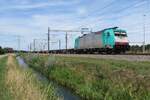 ATLU 186 233, leased by RTB Cargo, hauls an intermodal train filled with sailing ship fuel (...) and a few containers whilst passing through Valburg on 13 November 2022.