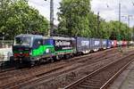 TX 193 278 holds a plea for Europe while hauling an intermodal train through Köln Süd on 8 June 2019.