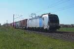 Railpool/TX Logistics 193 215 hauls a containertrain through St.H�lfe (near Diepholz) on 23 April 2026.