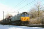 Opel train with 266 453 passing Alverna in the snow on 24 December 2009.