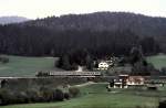 211 with local train near to Bodenmais Bavarian Forrest, October 1989.