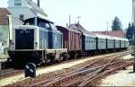 211 154-0 with scholar train at Krumbach at July 24th, 1983.