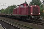 On a grey 25 September 2011, Nesa 211 019 hauls a railway maintenance train through Hamburg-Harburg.