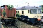212 244-8 and 427 404-7 at Gppingen, June 21st, 1984.
