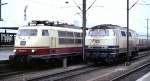103 123-6 and 218 902-5 (an ex. class 210 engine with additional gas turbine) at Hannover, January 22nd, 1984.