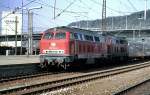 215 203-8 and a second 218 with extra train with peacable demonstrators to form a closed chain of humans between Stuttgart and the US military area Willey-barracks at Neu-Ulm. It was a demonstration against weapons to be statinated in Germany. Plochingen, October 22nd, 1983.