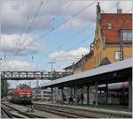 The DB 218 421-6 and an other one are arriving wiht his EC at the Lindau Main Station.