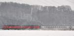 Two 218 with RE/IC Allgu from Oberstdorf to Hannover between Bellenberg and Vhringen. The new snow is whirled up by the train with speed of approx. 140 km/h, January 8th, 2010. The train was perfect in time.