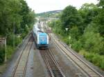 223 066 is driving in Oberkotzau on June 30th 2013.